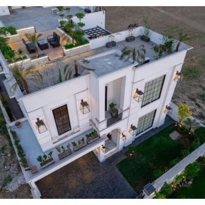 1 kanal House with 2 Floors, Partial Basement and 200 sq.ft extra covered area.