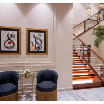 1 kanal House with 2 Floors, Partial Basement and 200 sq.ft extra covered area.