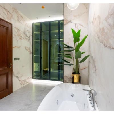 1 kanal House with 2 Floors, Partial Basement and 200 sq.ft extra covered area.